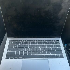 Mac book, will cost $450 to fix do to minor damage but still useable.